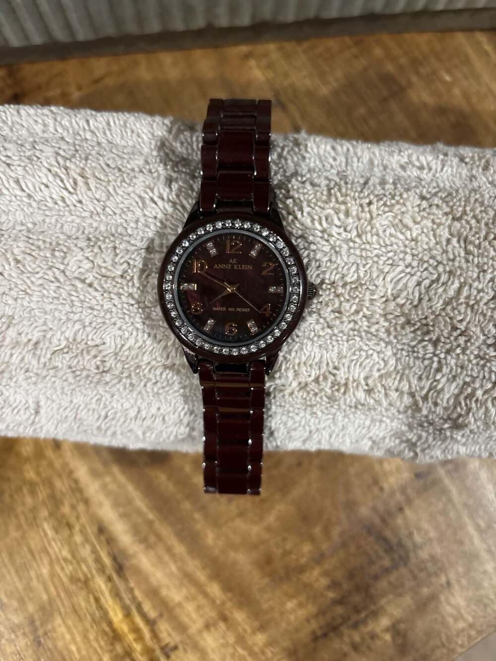 Anne Klein Women's 10/9341 Brown Ceramic Bracelet Watch with Crystal Bezel
